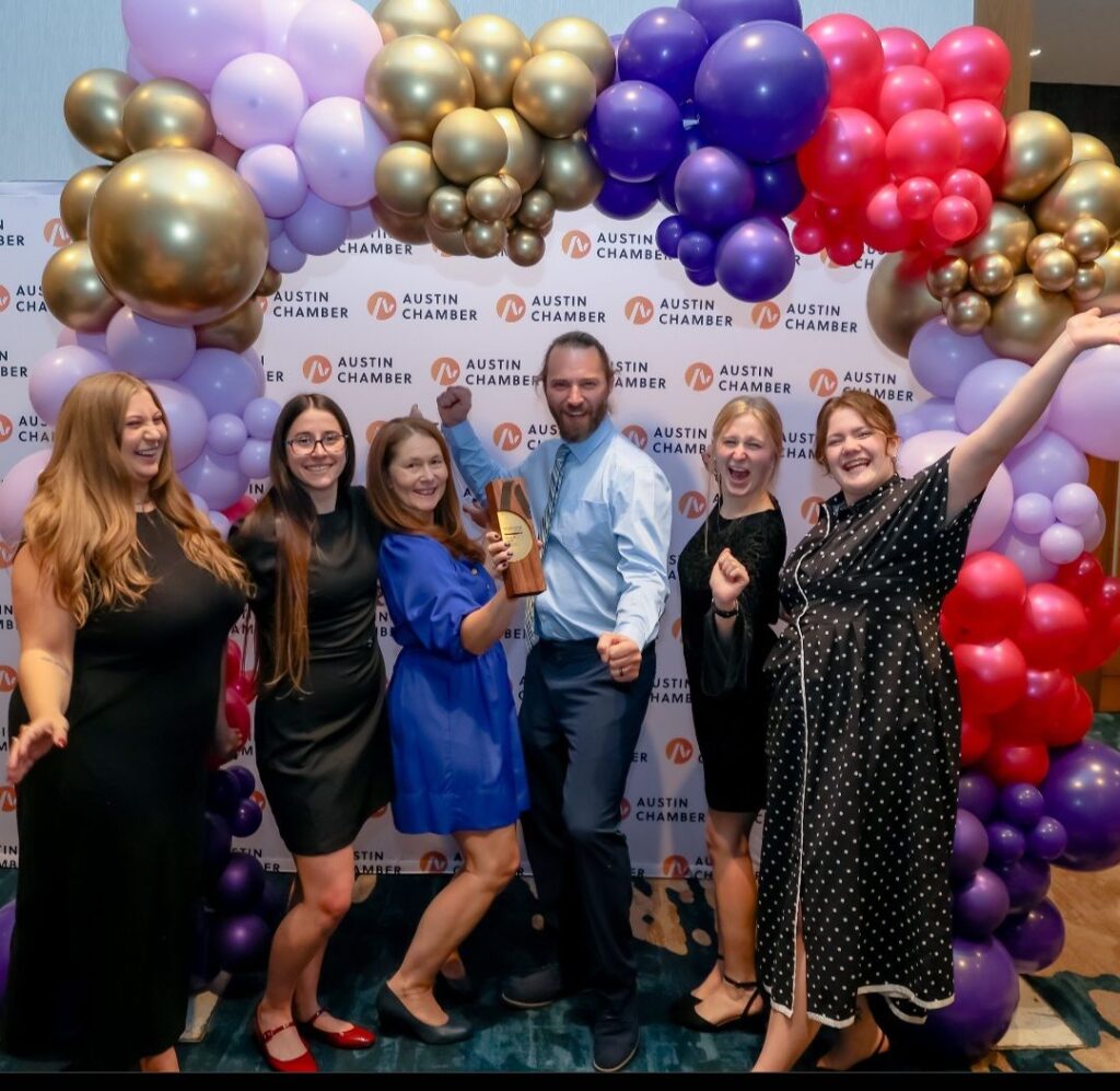 Jump! Gymnastics group team photo at 2025 Greater Austin Business Awards receiving the
award for Entrepreneurial Vision