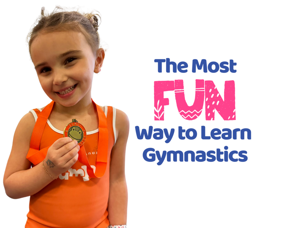 4 year old gymnast holding a medal
